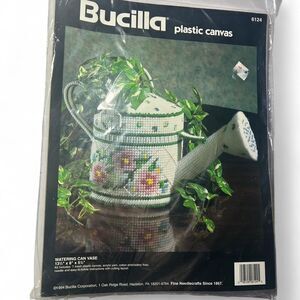 New in package Bucilla plastic canvas kit for a Watering Can Vase